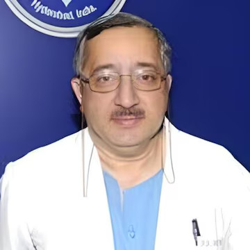 Manu Tandan, MD Headshot